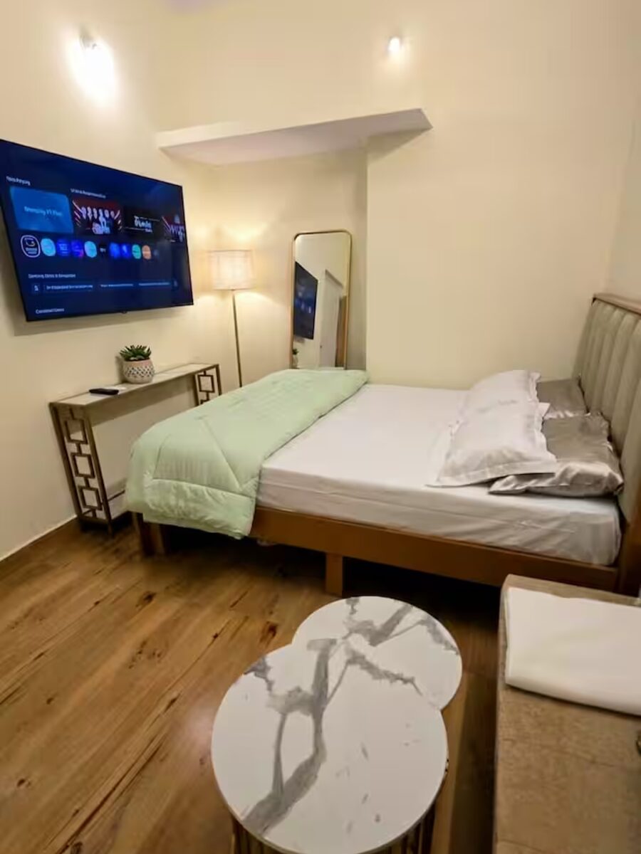 Bedroom with queen bed and Smart TV