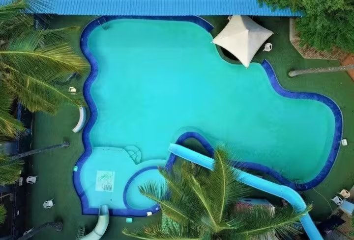 Pool at Patels Inn Club & Resort, one minute walk away